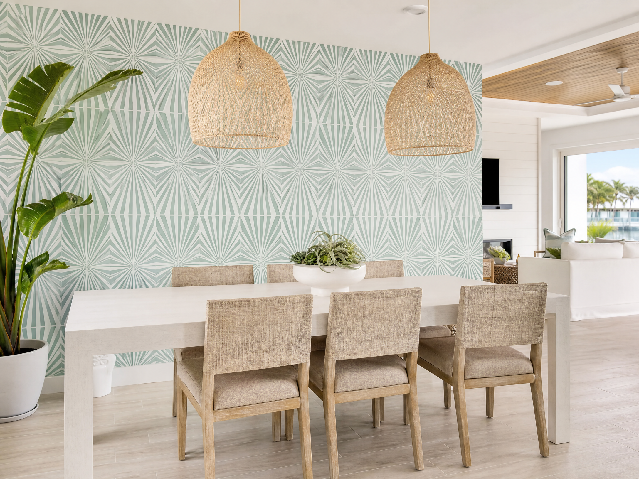 Florida coastal dining room with seafoam geometric wallpaper accent wall